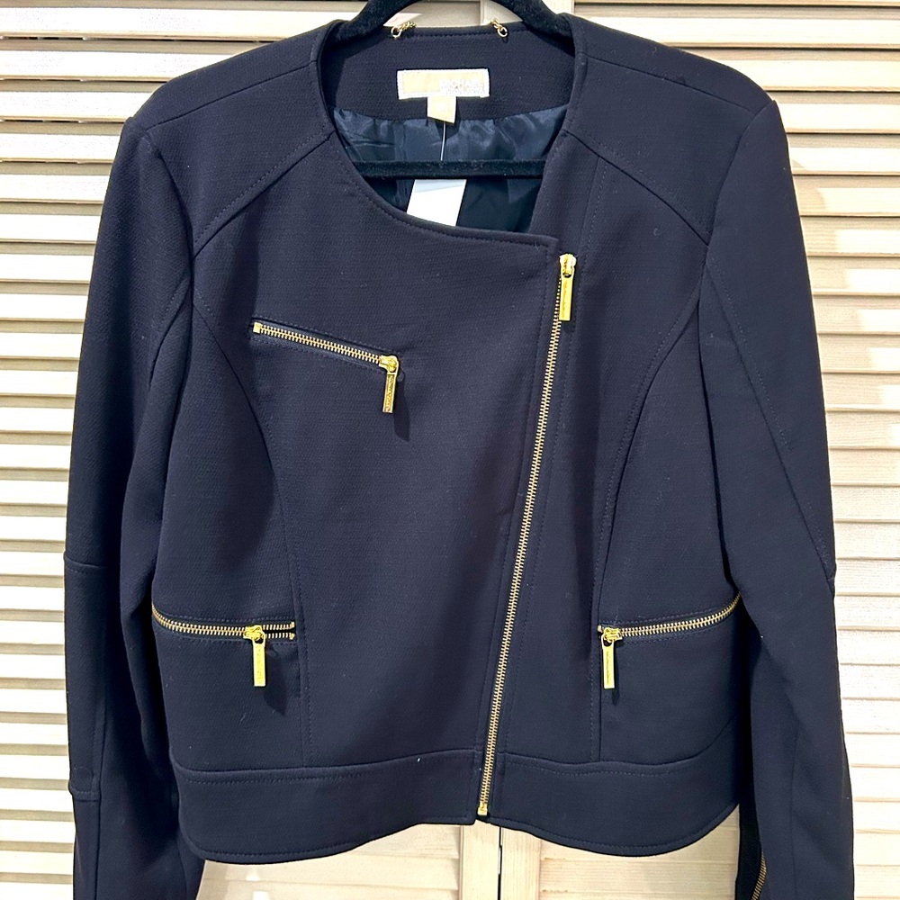 Micheal Kors black Moto jacket with gold detailing. Size XL